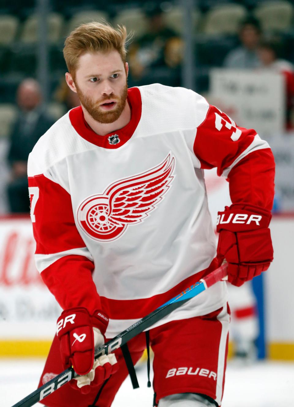 Detroit Red Wings forward J.T. Compher (37) warms up before the game against the Pittsburgh Penguins at PPG Paints Arena in Pittsburgh on Wednesday, Oct. 4, 2023.