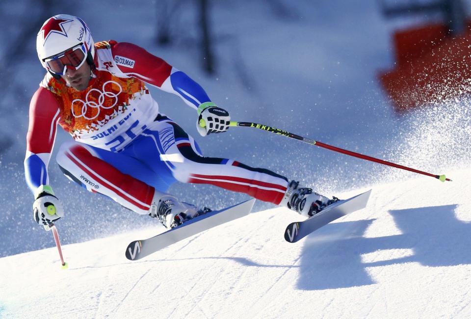 France's Adrien Theaux skis during the downhill run of the men's alpine skiing super combined event at the 2014 Sochi Winter Olympics at the Rosa Khutor Alpine Center February 14, 2014. REUTERS/Ruben Sprich