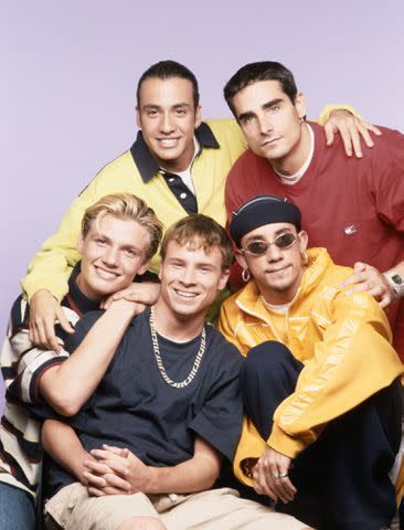 <p>Tim Roney/Getty</p> Backstreet Boys band in the '90s: AJ McLean, McLean, Nick Carter, Howie Dorough, Kevin Richardson and Brian Littrell.