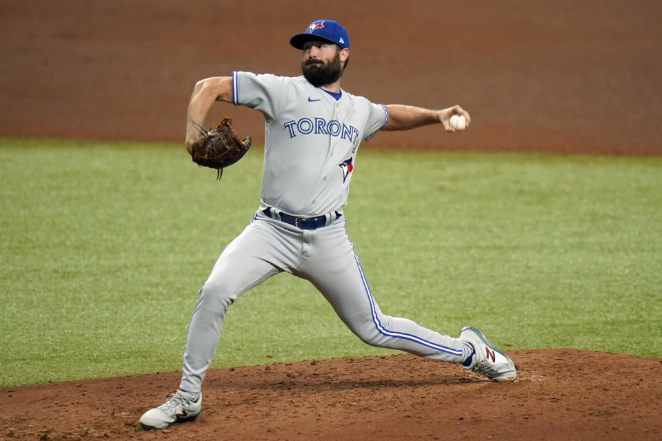 Toronto Blue Jays' Robbie Ray pitches to the Tampa Bay Rays during the fourth inning of Game 1 of a wild card series playoff baseball game Tuesday, Sept. 29, 2020, in St. Petersburg, Fla. (AP Photo/Chris O'Meara)