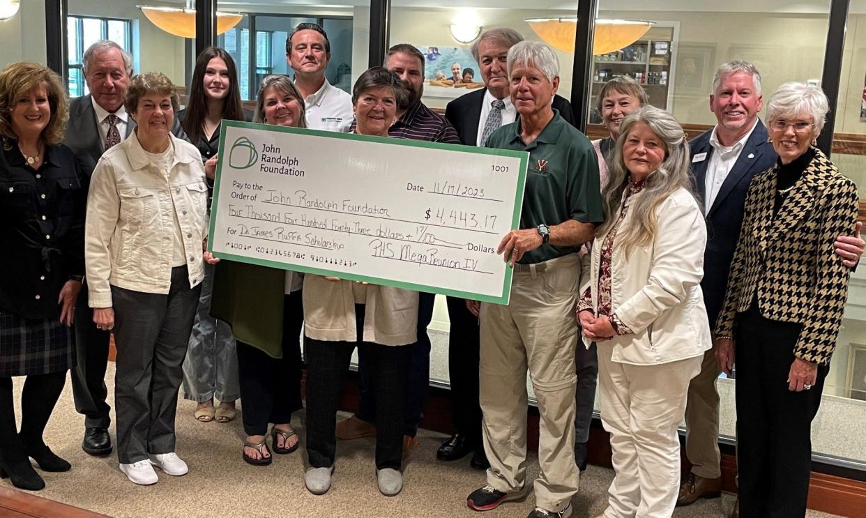 Petersburg High School alumni present a check for Appomattox Regional Governor’s School Dr. James L. Ruffa Scholarship Fund on November 17. L to R Front Row: Bonnie Falls, Director of Scholarship Program Services, John Randolph Foundation, Joyce Wallace, ’61, Jane Ruffa, JoAnne Ruffa, Jimbo VanLandingham, ‘68, Janet Fisher Callis ‘68, Linda Cairns,‘65. L to R Back Row: Jimmy Jacobs, ‘65, Anne Preston Ruffa, Chris Ruffa, James “Jay” Ruffa, Alfred Elmore ‘ 65, Judy Russell ‘65, Kevin Foster, Executive Director, John Randolph Foundation