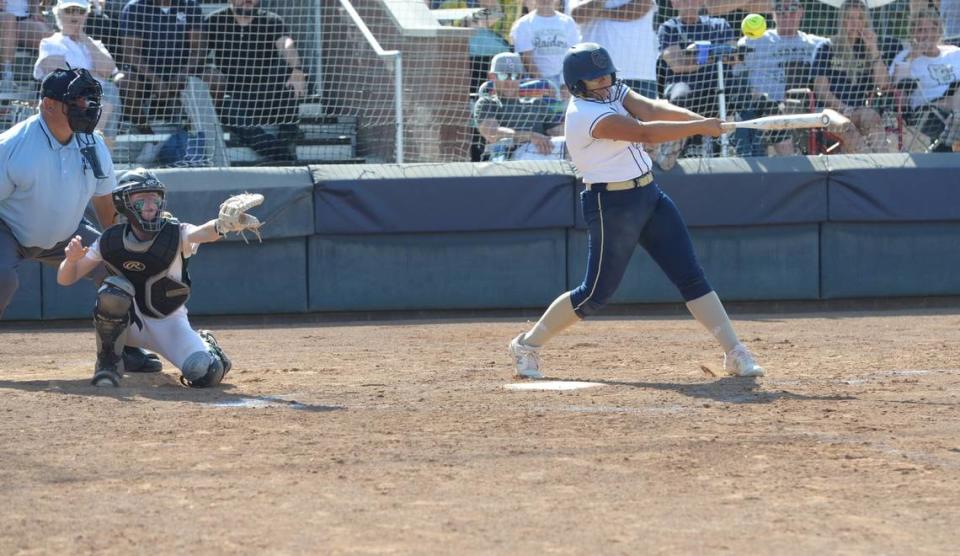 Central Catholic third baseman Jazzelyn Rios hits a pitch in the Sac-Joaquin Section Division III championship against Ponderosa at Cosumnes River College on Saturday, May 27. Central Catholic lost 1-0.