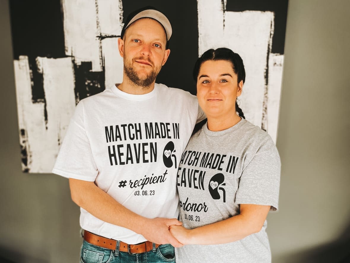 Colin Grieve and Brittany Hay wore T-shirts on the day of their surgeries that said 'match made in heaven.' (Submitted by Kelsey Grieve - image credit)