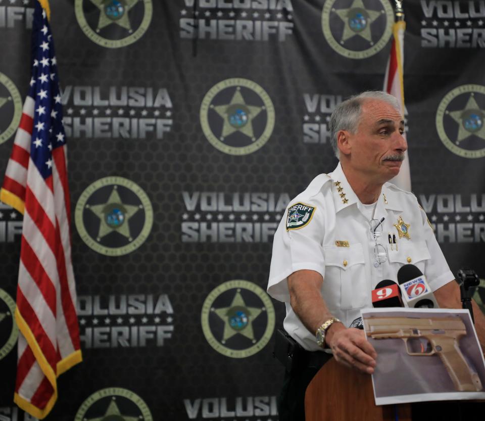 Volusia Sheriff Mike Chitwood shows a picture of a gun during a recent press conference. Chitwood said Monday that constitutional carry legislation would pass regardless of his feelings on the bill and that his focus is how to legally and safely police the community and keep his deputies safe while they do so.
