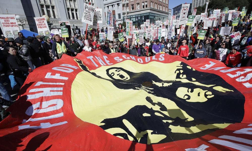 Teachers and supporters at a rally at Frank Ogawa Plaza in front of City Hall in Oakland, California.