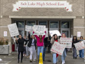 Students and teachers from East High School in Salt Lake City walk out of school to protest the HB15 voucher bill, on Wednesday, Jan. 25, 2023. Several years of pandemic restrictions and curriculum battles have emboldened longtime advocates of funneling public funds to private and religious schools in statehouses throughout the country. (Rick Egan/The Salt Lake Tribune via AP)