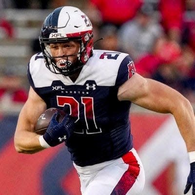 Garrett Owens, a tight end for the 2023 Houston Roughnecks, runs with the ball during the franchise's inaugural XFL season. Owens is a 2016 North East graduate who rushed for more than 5,100 with the Grapepickers. He also played college football for Mercyhurst University and Duquesne University ahead of his professional career.