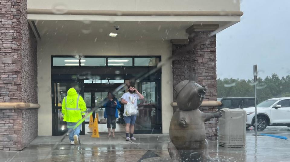 Customers come and go from Buc-ee's ahead of Hurricane Ian's arrival in Daytona Beach. The popular gas station and retail store was set to close at 2:30 p.m. Wednesday.