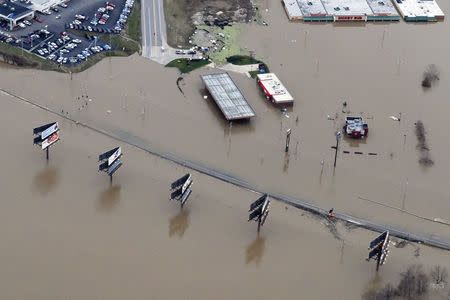 Submerged roads and houses are seen after several days of heavy rain led to flooding, in an aerial view over Union, Missouri December 29, 2015. REUTERS/Kate Munsch