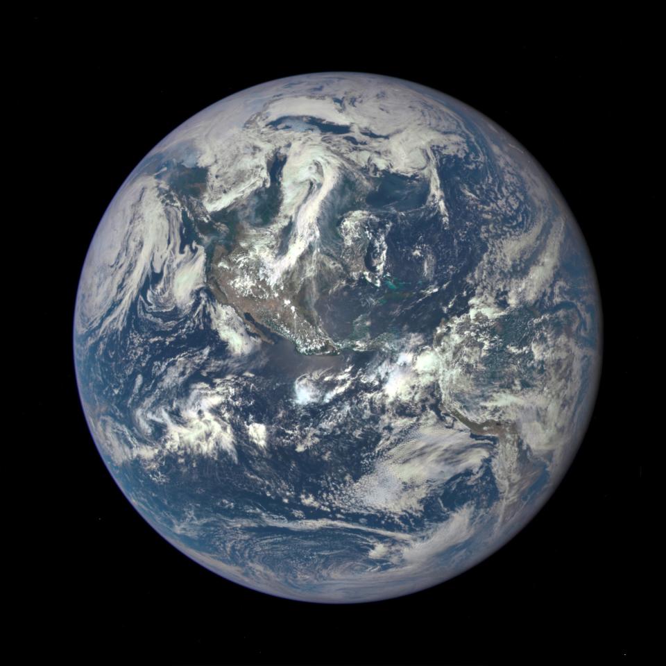 A photo of the Earth from space is shown.