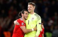 Football Soccer - Wales v Belgium - EURO 2016 - Quarter Final - Stade Pierre-Mauroy, Lille, France - 1/7/16 Wales' Gareth Bale and Wayne Hennessey celebrate at the end of the game REUTERS/Darren Staples Livepic