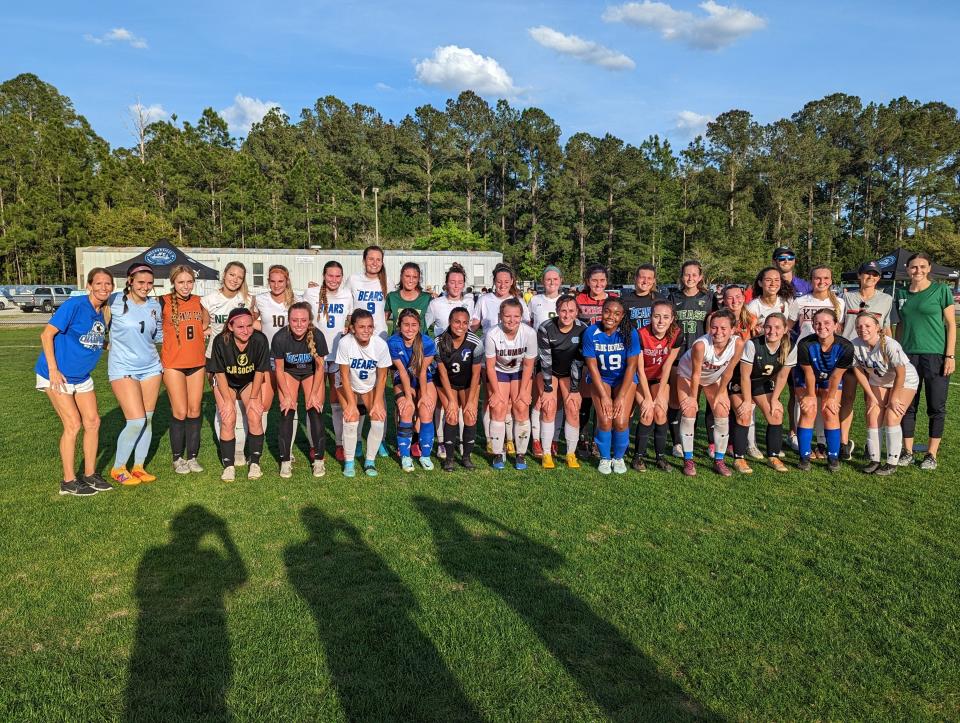 Players line up after the Northeast Florida Senior All-Star Classic for high school girls soccer on Sunday at Patton Park.