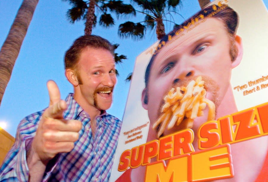 FILE – Morgan Spurlock poses at the Los Angeles premiere of his film “Super Size Me,” Thursday night, April 22, 2004, in the Hollywood section of Los Angeles. Spurlock, an Oscar-nominee who made food and American diets his life’s work, famously eating only at McDonald’s for a month to illustrate the dangers of a fast-food diet, has died. He was 53. (AP Photo/Mark J. Terrill)