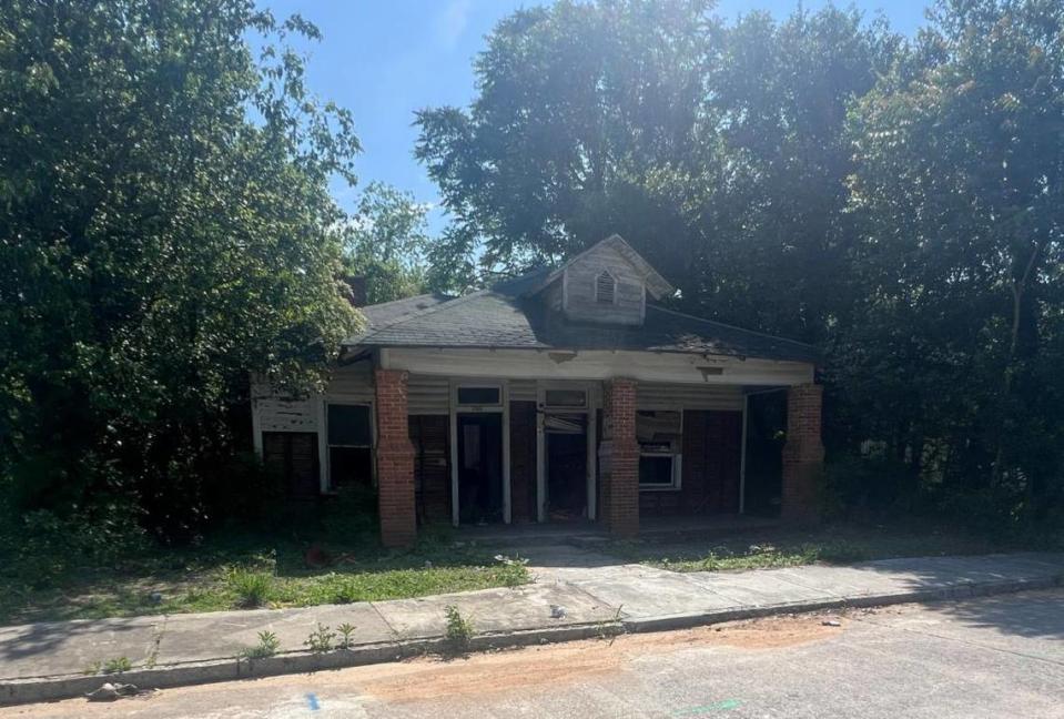 As part of its Blight Fight initiative, Macon-Bibb County tore down its 700th blighted structure. The abandoned residence was located close to two local schools. Courtesy Macon-Bibb County