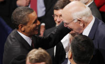 FILE - In this July 21, 2010, file photo President Barack Obama greets Paul Volcker, Chair of the President's Economic Recovery Advisory Board, after Obama signed the Dodd-Frank Wall Street Reform and Consumer Protection financial reform bill at the Ronald Reagan Building in Washington. Volcker, the former Federal Reserve chairman died on Sunday, Dec. 8, 2019, according to his office, He was 92. (AP Photo/Charles Dharapak, File)