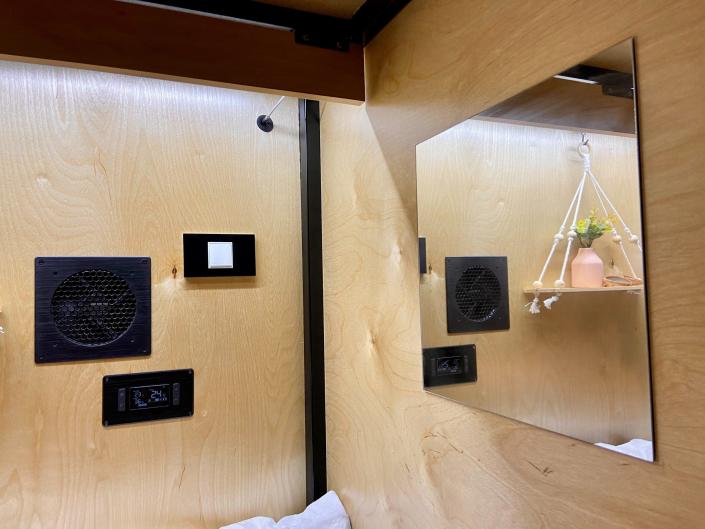 Inside a compact sleep pod in co-living house