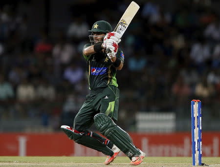 Pakistan's Ahmed Shehzad plays a shot during their fourth one-day international cricket match against Sri Lanka in Colombo July 22, 2015. REUTERS/Dinuka Liyanawatte