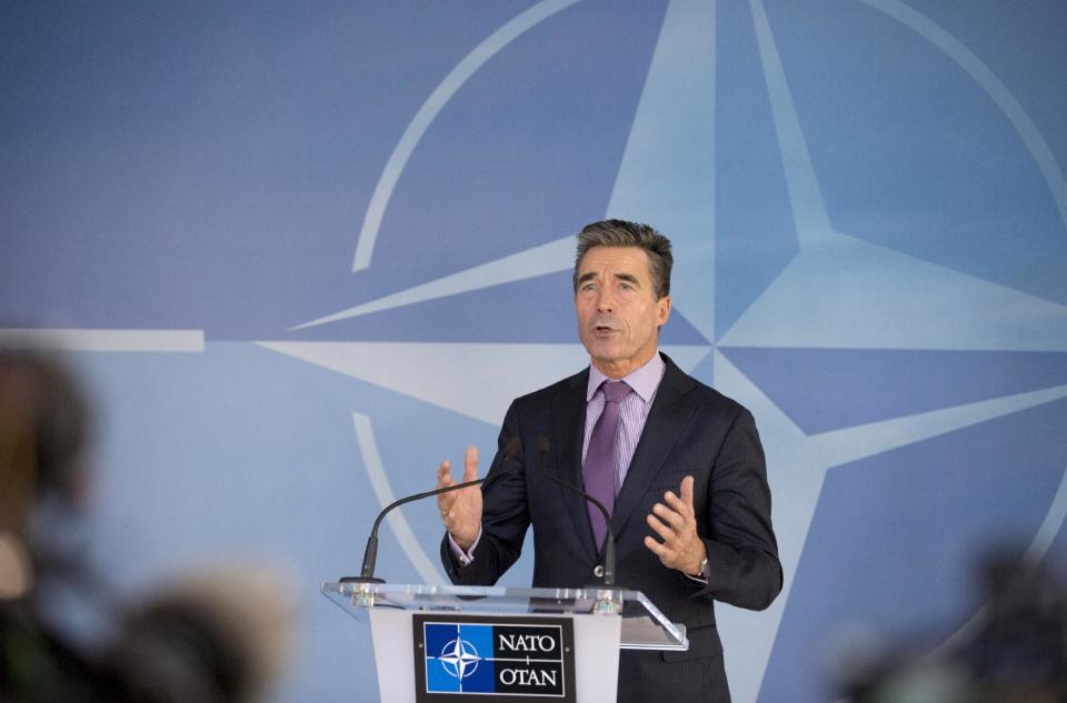 NATO Secretary General Anders Fogh Rasmussen speaks during media conference, prior to a meeting of defense ministers of the North Atlantic Council, at NATO headquarters in Brussels on Wednesday, Feb. 26, 2014. Frustrated with his Afghan counterpart, U.S. President Barack Obama is ordering the Pentagon to accelerate planning for a full U.S. troop withdrawal from Afghanistan by the end of this year. But Obama is also holding out hope that Afghanistan's next president may eventually sign a stalled security agreement that could prevent the U.S. from having to take that step. (AP Photo/Virginia Mayo)