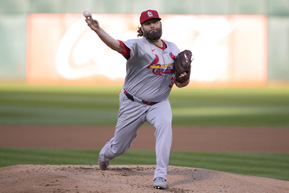 St. Louis Cardinals pitcher Lance Lynn works against the Oakland Athletics during the first inning of a baseball game in Oakland, Calif., Tuesday, April 16, 2024. (AP Photo/Tony Avelar)