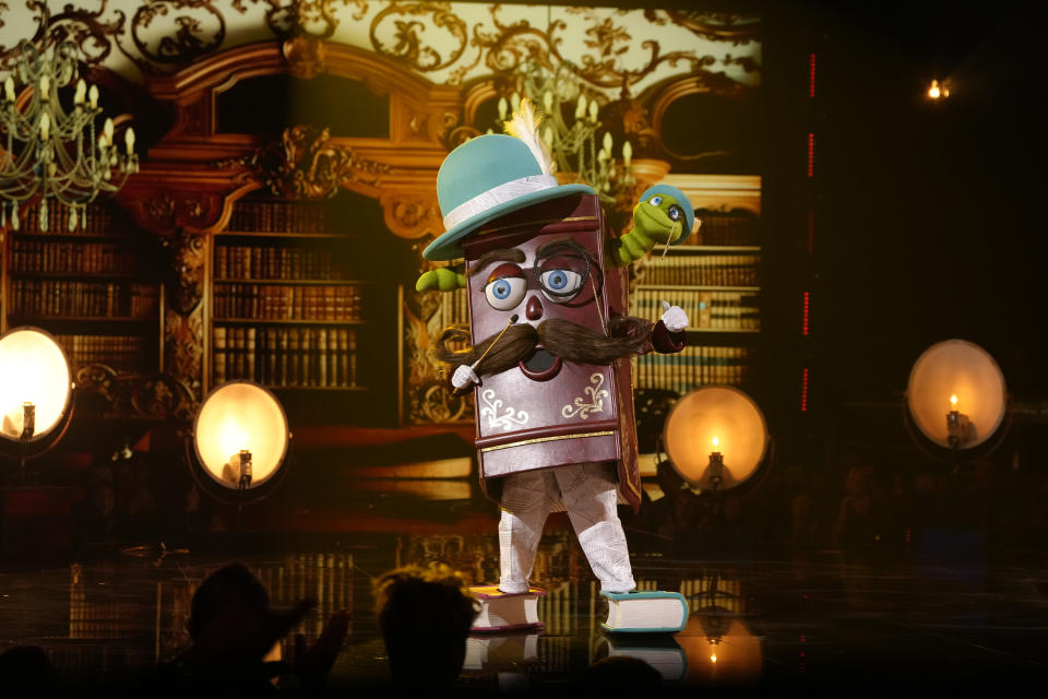 THE MASKED SINGER: Book in the season  11 premiere episode of THE MASKED SINGER airing Wednesday, March 6 (8:00 PM - 9:02 PM ET/PT) on FOX. CR: Michael Becker / FOX. ©2024 FOX Media LLC.