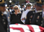 <p>Cindy McCain and her son, Jack McCain, follow behind military personal carrying the casket of Sen. John McCain, R-Ariz., into the Capitol rotunda for a memorial service, Wednesday, Aug. 29, 2018, at the Capitol in Phoenix. (Photo: Matt York/AP) </p>
