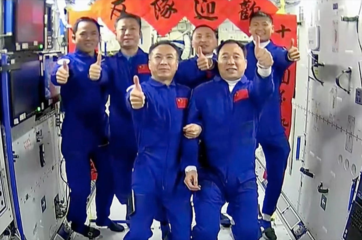  China's Shenzhou 15 and Shenzhou 16 crews join together aboard the country's Tiangong space station on Tuesday, May 30, 2023. The six taikonauts include Fei Junlong, Deng Qingming Zhang Lu, Jing Haipeng, Zhu Yangzhu and Gui Haichao. 