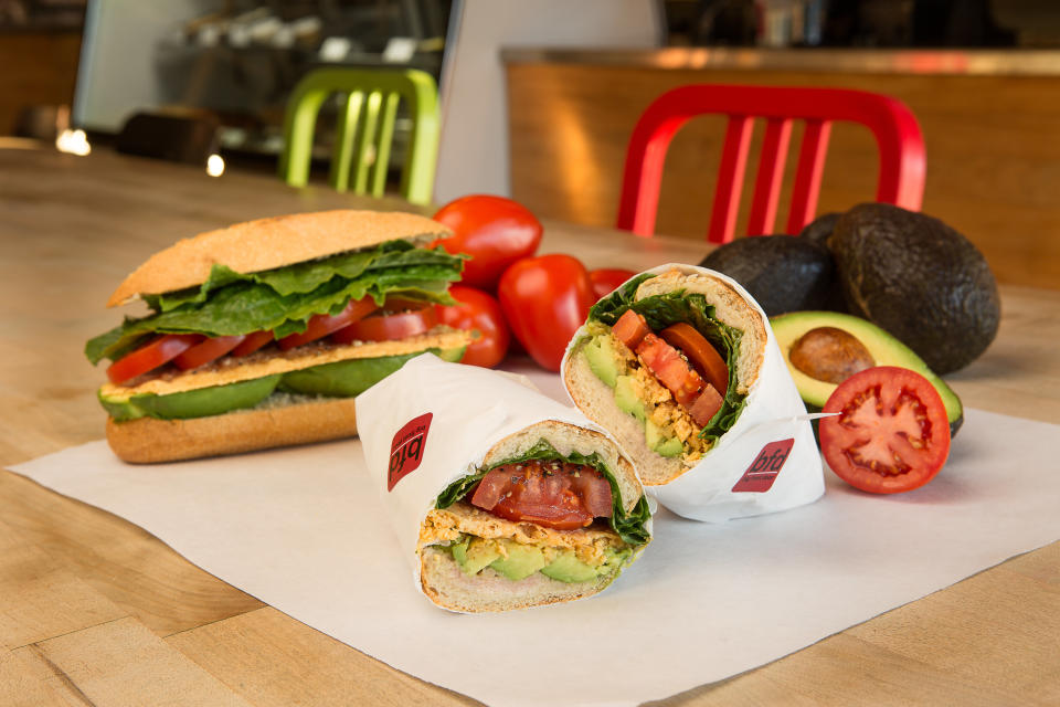 A naturally vegetarian (but completely satisfying!) sammie with a stack of avocado, tomatoes, a parmesan crisp, lettuce, and oil and vinegar on a torpedo roll. (Photo: Big Front Door)