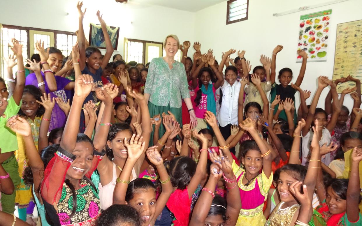 Sylvia with some of her sponsored children last year - Courtesy of Sylvia