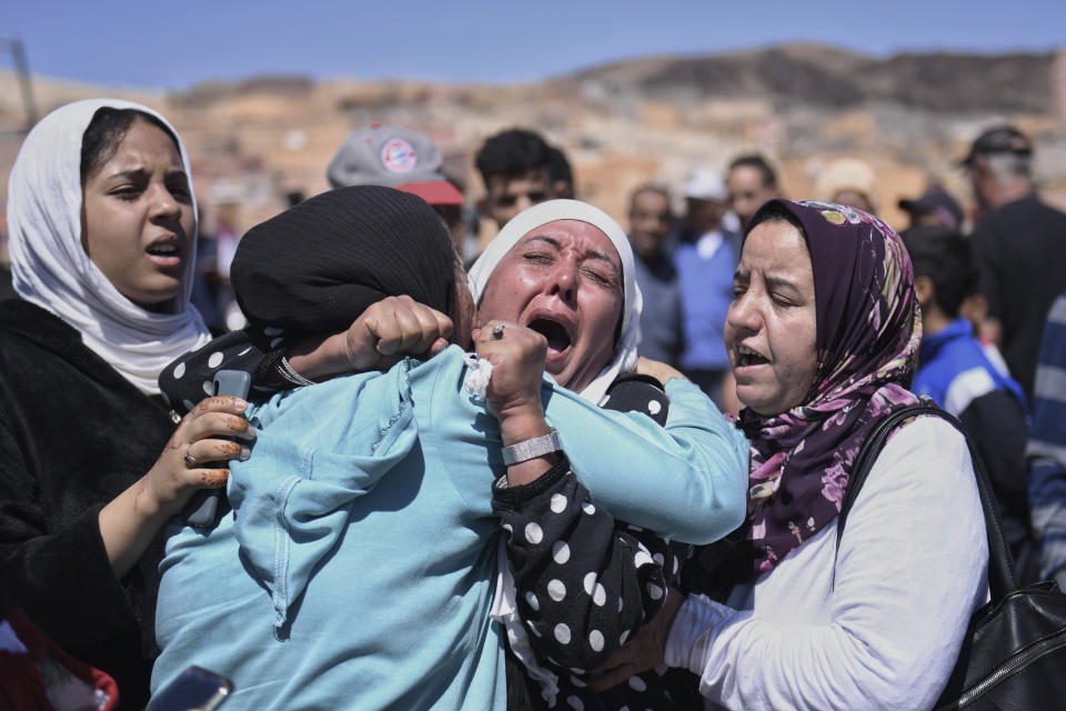 Women cry as they mourn victims of the earthquake in Moulay Brahim in the province of Al Haouz, Morocco, Sunday Sept. 10, 2023. An aftershock rattled Moroccans on Sunday as they prayed for victims of the nation’s strongest earthquake in more than a century and toiled to rescue survivors while soldiers and workers brought water and supplies to desperate mountain villages in ruins. (Fernando Sanchez/Europa Press via AP)