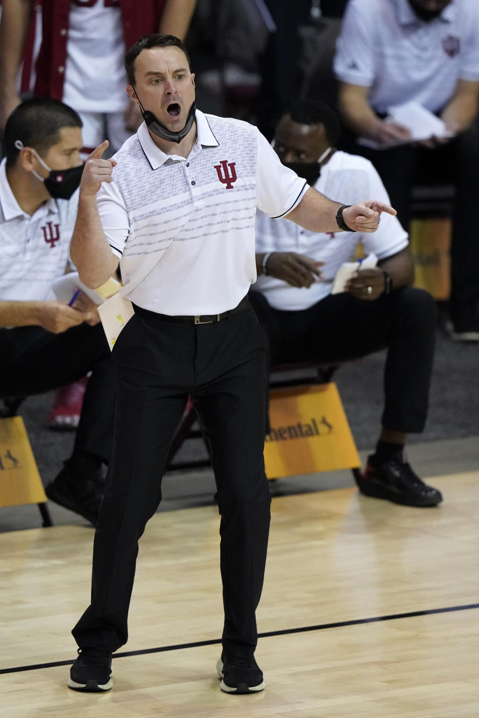 Indiana head coach Archie Miller directs his team in the first half of a semifinal NCAA college basketball game in the Maui Invitational tournament against Texas, Tuesday, Dec.1, 2020, in Asheville, N.C. (AP Photo/Kathy Kmonicek)