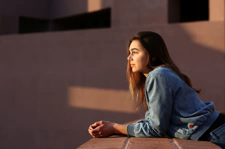 Former Biological Resource Center intern Emily Glynn, 24, poses for a portrait at the Arizona State University Art Museum in Tempe, Arizona, U.S., December 17, 2017. REUTERS/Caitlin O'Hara