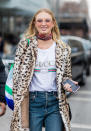 <p>Dutch model Romee Strijd wore the white logo T-shirt with a leopard jacket and denim jeans during New York Fashion Week in 2017. (Photo: Getty Images) </p>