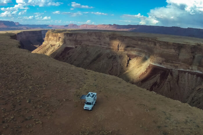 Tacoma and Four Wheel Camper on the rim of Marble Canyon