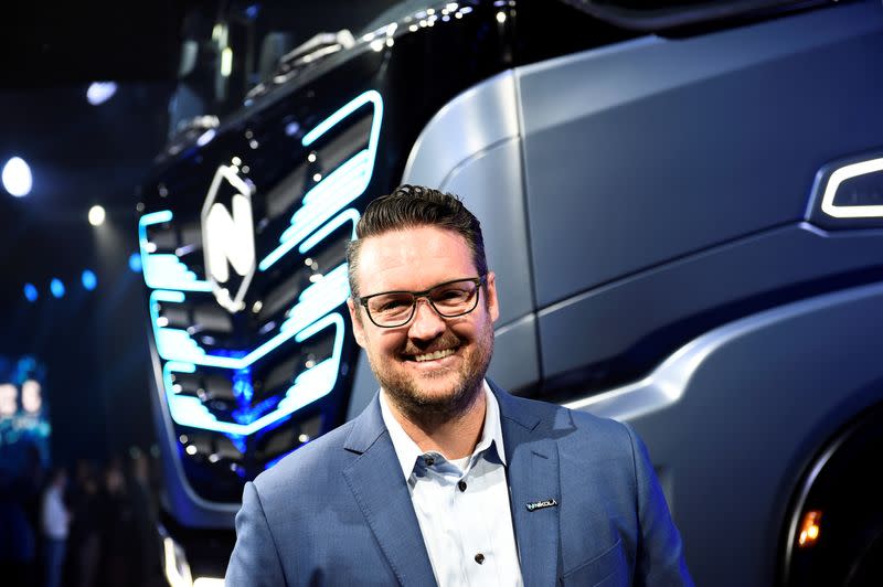 FILE PHOTO: CEO and founder of U.S. Nikola, Trevor Milton speaks during presentation of its new full-electric and hydrogen fuel-cell battery trucks in partnership with CNH Industrial, at an event in Turin