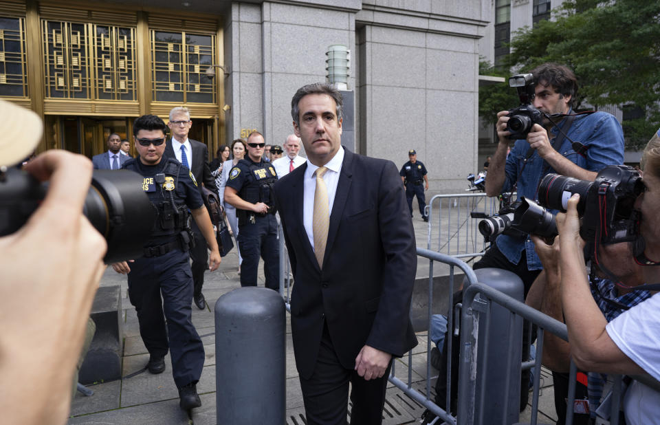 Michael Cohen, former personal lawyer to President Donald Trump, leaves federal court after reaching a plea agreement in New York, Tuesday, Aug. 21, 2018. (AP Photo/Craig Ruttle)