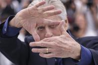 Michael Douglas poses for photographers at the photo call honoring him with a Palme d'Or at the 76th international film festival, Cannes, southern France, Tuesday, May 16, 2023. (Photo by Vianney Le Caer/Invision/AP)