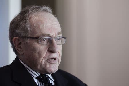 Attorney and law professor Alan Dershowitz discusses allegations of sex with an underage girl levelled against him, during an interview at his home in Miami Beach January 5, 2015. REUTERS/Andrew Innerarity