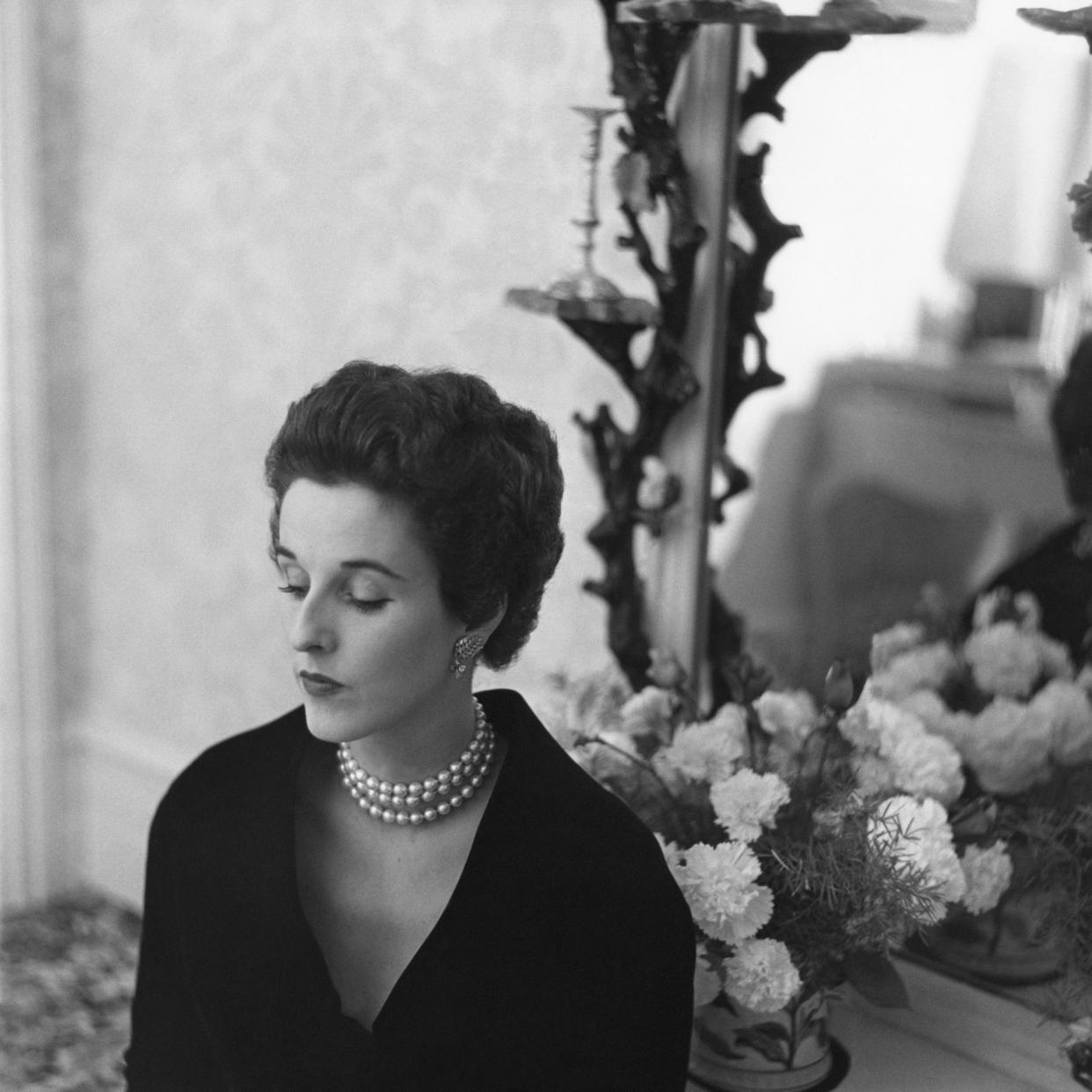 Newlywed Babe Paley in her bedroom at Kiluna Farm, Manhasset, New York, 1948.