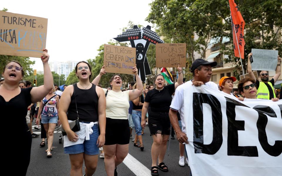 Protesters protest against mass tourism in Barcelona