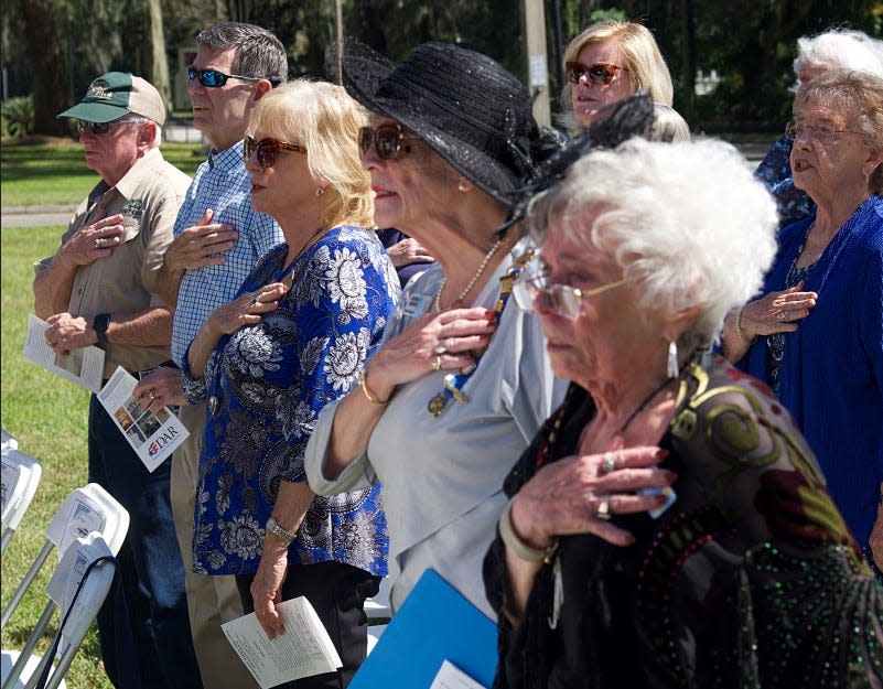 Members of the Ocala DAR Chapter, NSDAR, attend the dedication of an historic marker at the Helvenston House on Oct. 9.