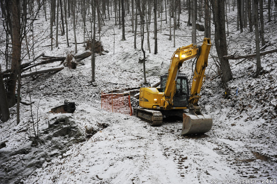 This 2018 photo released by Federal Bureau of Investigation shows the FBI's 2018 dig for Civil War-era gold at a remote site in Dents Run, Penn., after sophisticated testing suggested tons of gold might be buried there. (Federal Bureau of Investigation via AP)