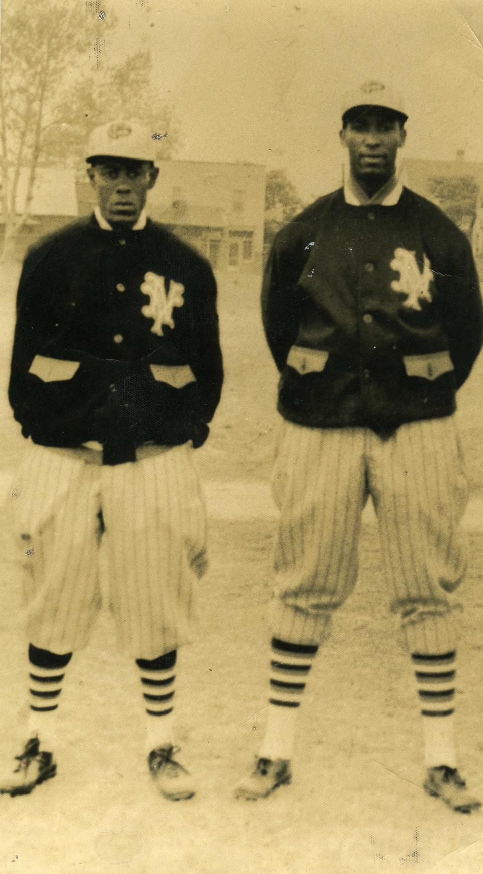 Martín Dihigo (right) with teammate Alejandro Oms with the New York Cubans in 1935.
