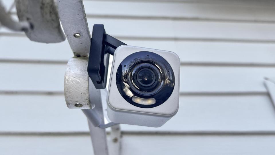 Wyze Cam v4 magnetically mounted to metal plant hanger