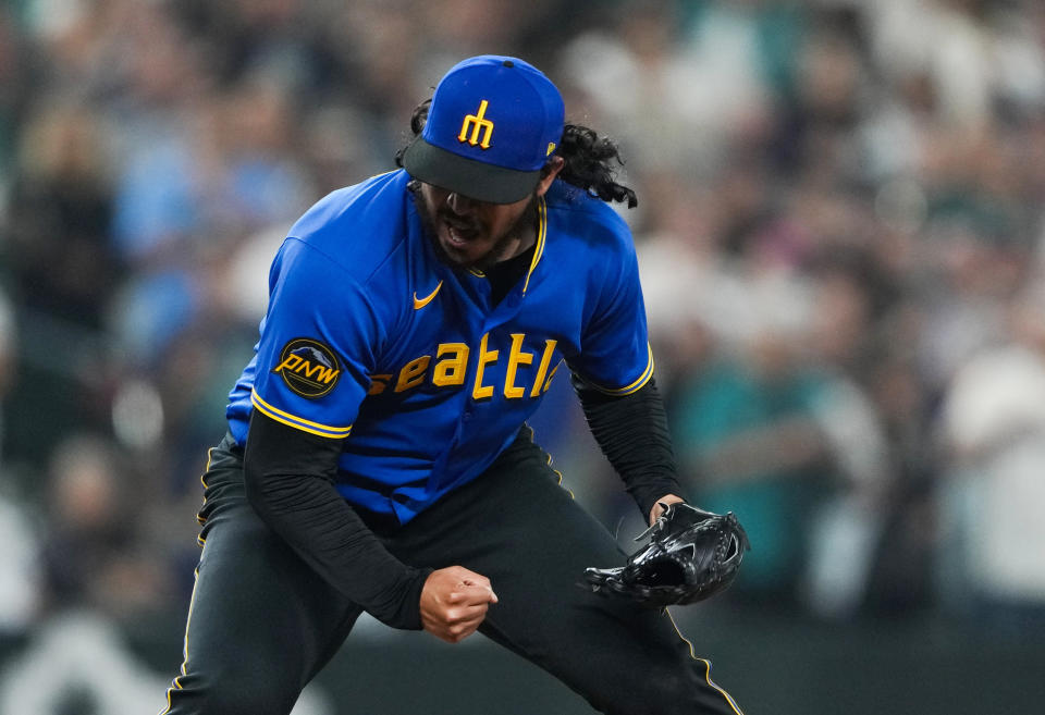 Seattle Mariners relief pitcher Andres Munoz celebrates the team's win against the Kansas City Royals in a baseball game Friday, Aug. 25, 2023, in Seattle. (AP Photo/Lindsey Wasson)