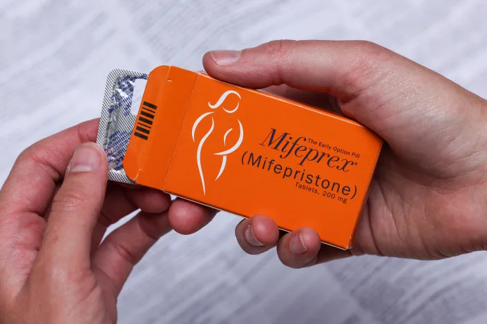 A pack of Mifeprex pills, used to terminate early pregnancies, is displayed in this picture illustration taken May 11, 2022. REUTERS/Caitlin Ochs/Illustration