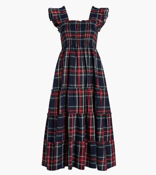 The royal wore an affordable and comfy tartan dress for her journey home. (Hill House)