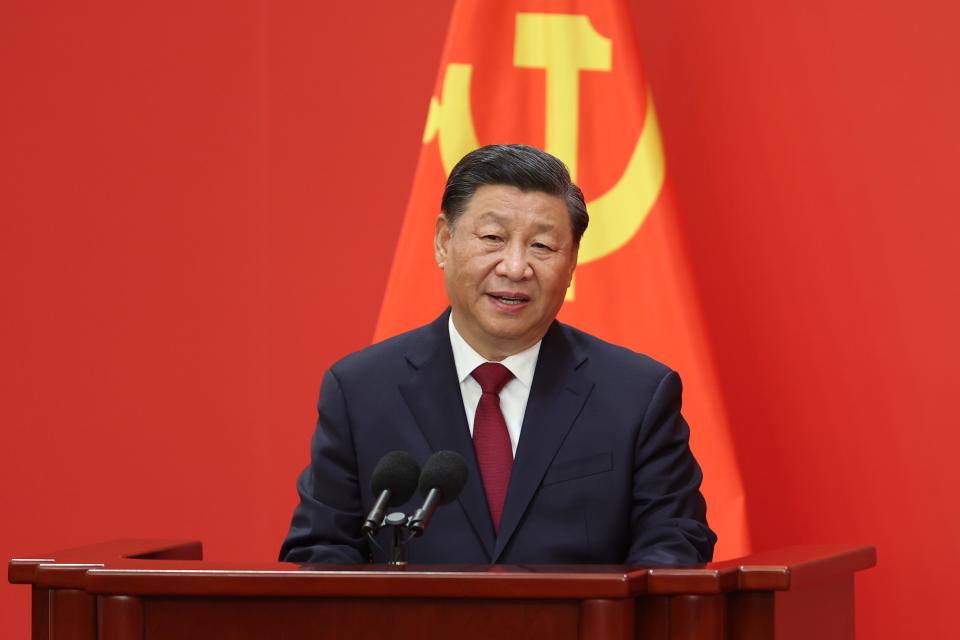 Chinese President Xi Jinping speaks at the podium during the meeting between members of the standing committee of the Political Bureau of the 20th CPC Central Committee and Chinese and foreign journalists at The Great Hall of People on October 23, 2022 in Beijing, China.