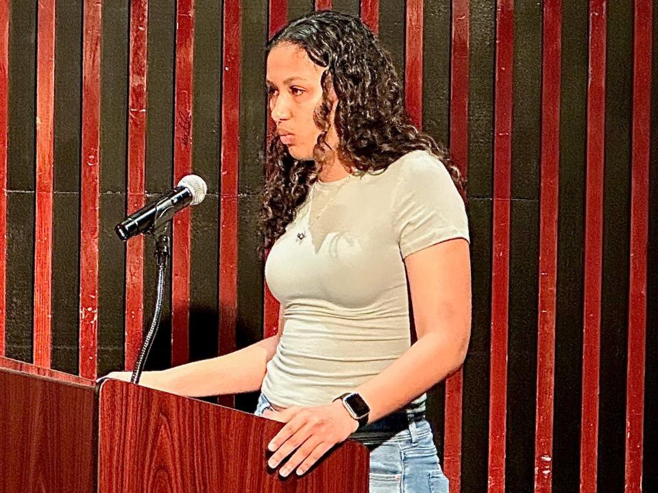 Brockton High School senior and student ambassador Amelia Vieira speaks to the Brockton School Committee on April 9, 2024 about the impact of the district's decision to cut positions in its office of Equity, Diversity and Inclusion.