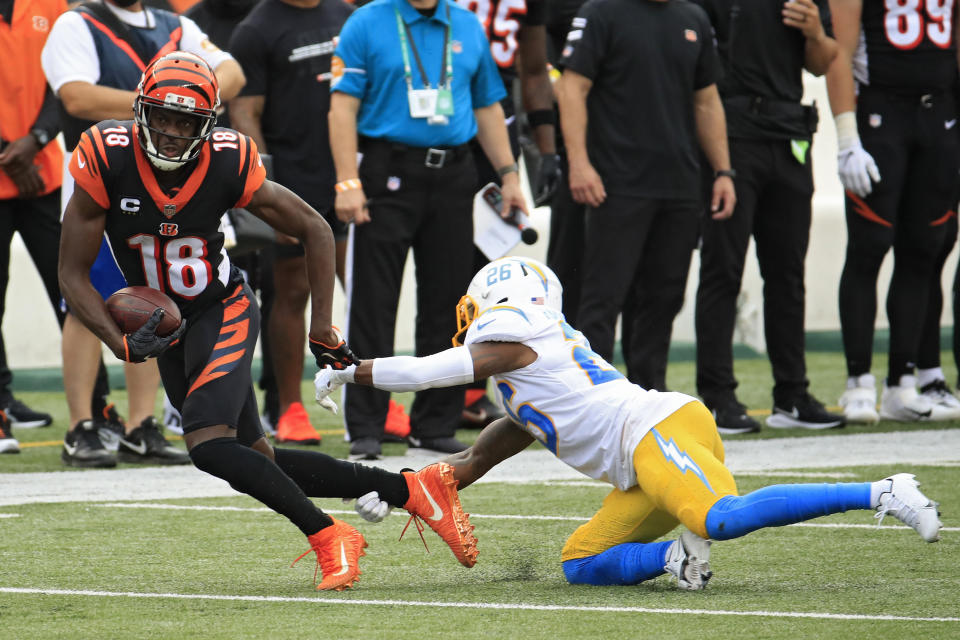 CINCINNATI, OHIO - SEPTEMBER 13: Wide receiver A.J. Green #18 of the Cincinnati Bengals rushes past cornerback Casey Hayward #26 of the Los Angeles Chargers during the second half at Paul Brown Stadium on September 13, 2020 in Cincinnati, Ohio. (Photo by Andy Lyons/Getty Images)