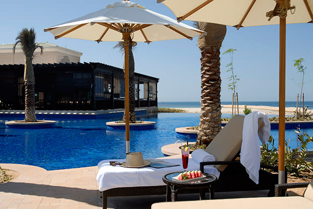 <div class="caption-credit"> Photo by: Courtesy of Desert Island Resort & Spa by Anantara</div><b>Desert Islands, Abu Dhabi <br></b> <br> <b>Where to stay:</b> <a rel="nofollow noopener" href="http://desertislands.anantara.com/" target="_blank" data-ylk="slk:Desert Island Resort & Spa by Anantara;elm:context_link;itc:0;sec:content-canvas" class="link ">Desert Island Resort & Spa by Anantara</a> <br> <br> <b>Why we love it:</b> Located on the little-known island of Sir Bani Yas, the property sits between rolling sanddunes and the gorgeous Arabian Gulf. Villas have private pools and direct beach access. <br> <br> <b>What you'll do there:</b> Have a private candlelit dinner on the beach, a couples' massage overlooking the Arabian Gulf, or ride an Arabian horse at the Sir Bani Yas Stables. <br> <br> <b>Rates:</b> start at $518 per night in a Deluxe Seaview Room